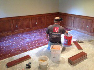 flooring installer installs tile